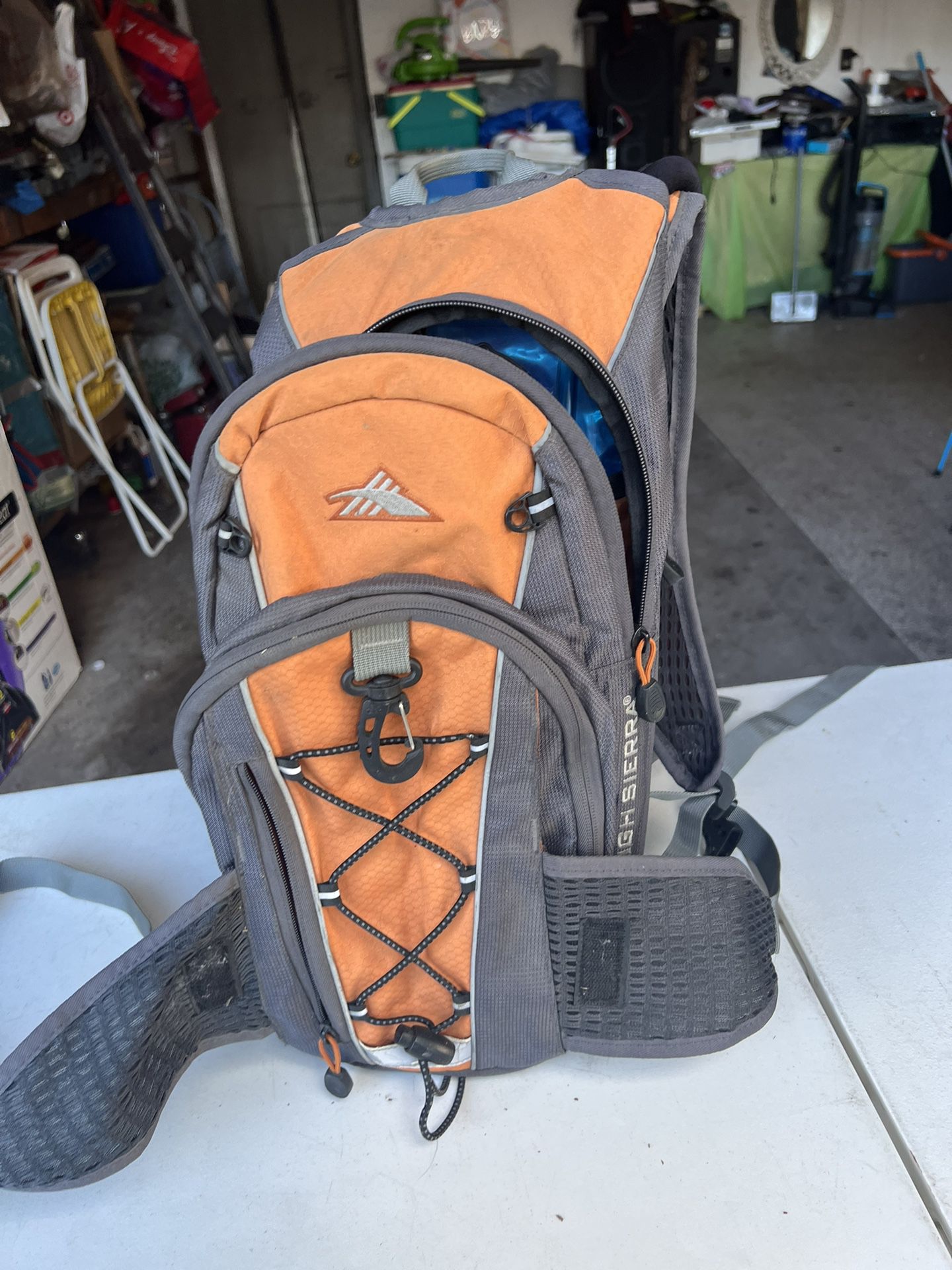 High Sierra orange Camel Pak backpack 