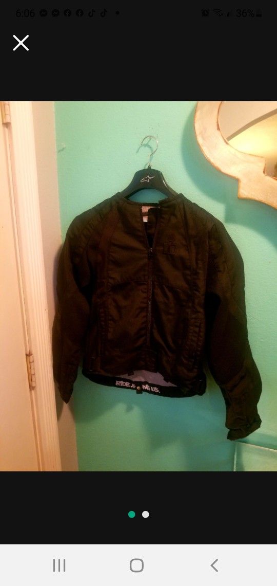 ICON MERC MOTORCYCLE JACKET WITH PADS...SIZE MED WOMENS...LIKE NEW!!