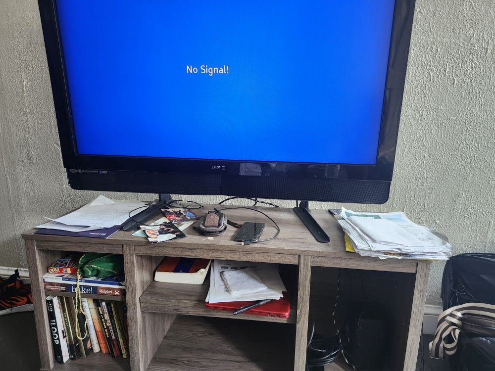TV AND STAND $200