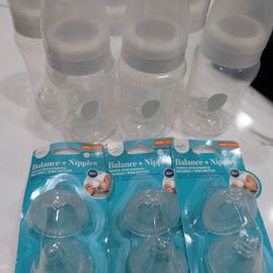 Evenflo Bottles & Brand New Nipples