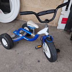 Trek Trikester tricycle, a durable steel-framed three-wheeler designed for toddlers featuring adjustable seats and handlebars