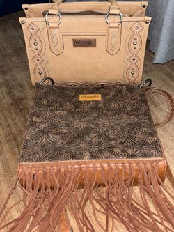 2 wrangler purses new for $55