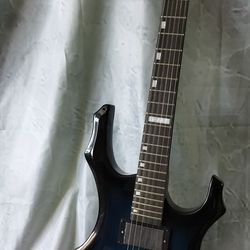 Brand new electric guitar with bag cable and shoulder strap