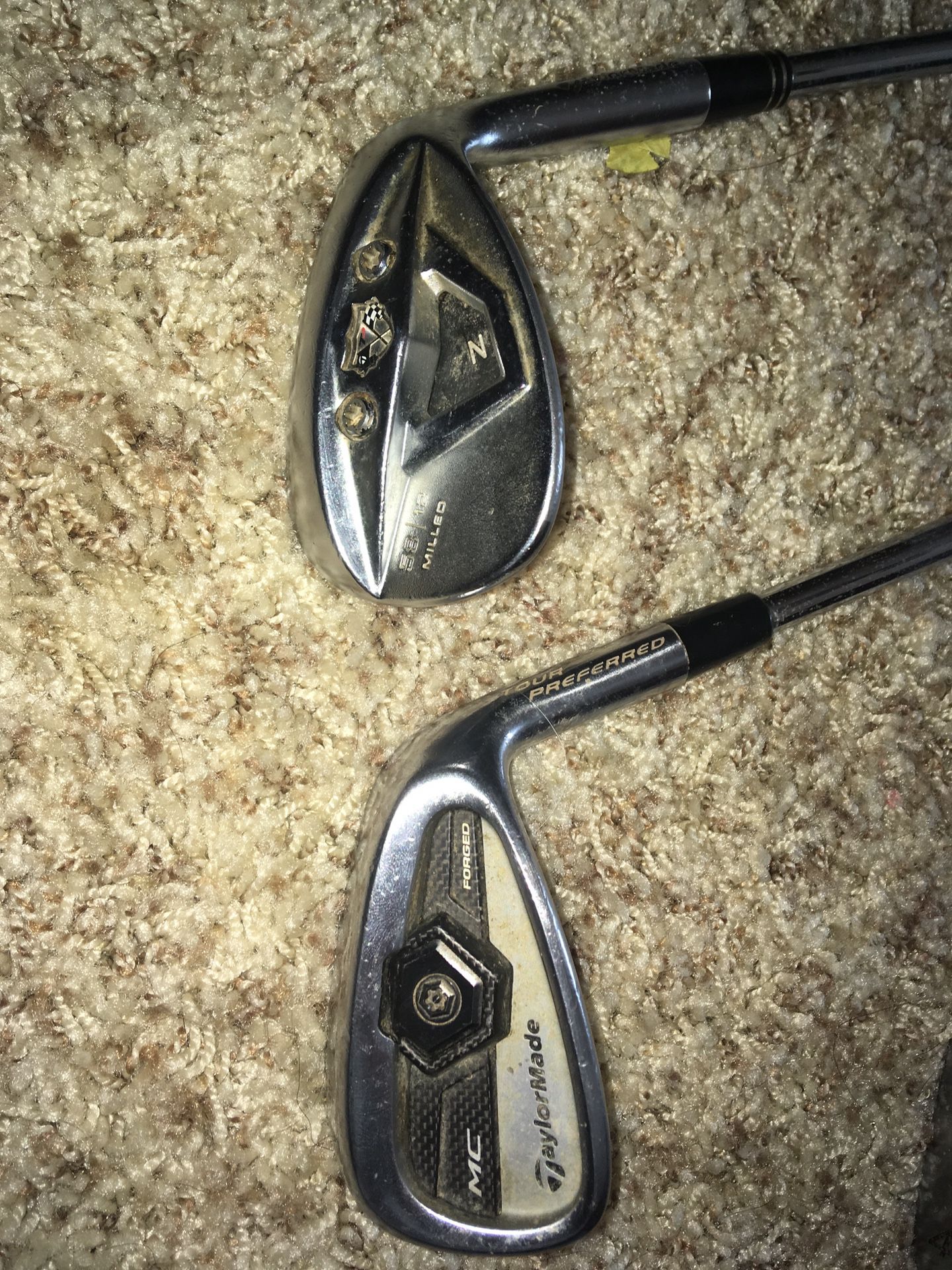 TaylorMade golf club set. Includes pitching wedge, sand wedge, 49