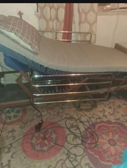 Hospital bed with remote control