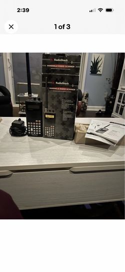 RadioShack handheld scanner battery powered also plug-in transformer powered comes with a box manual new RadioShack handheld scanner battery powered a
