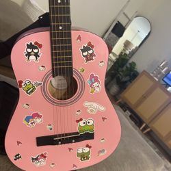 Pink guitar with case 