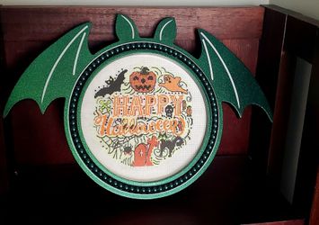 Spooky metallic bat frame with handmade Halloween sampler