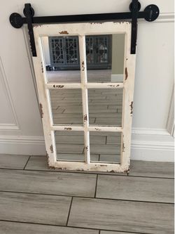 Two matching farm house mirrors
