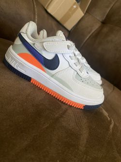Nike Air Force 1 Low trainers in white and blue