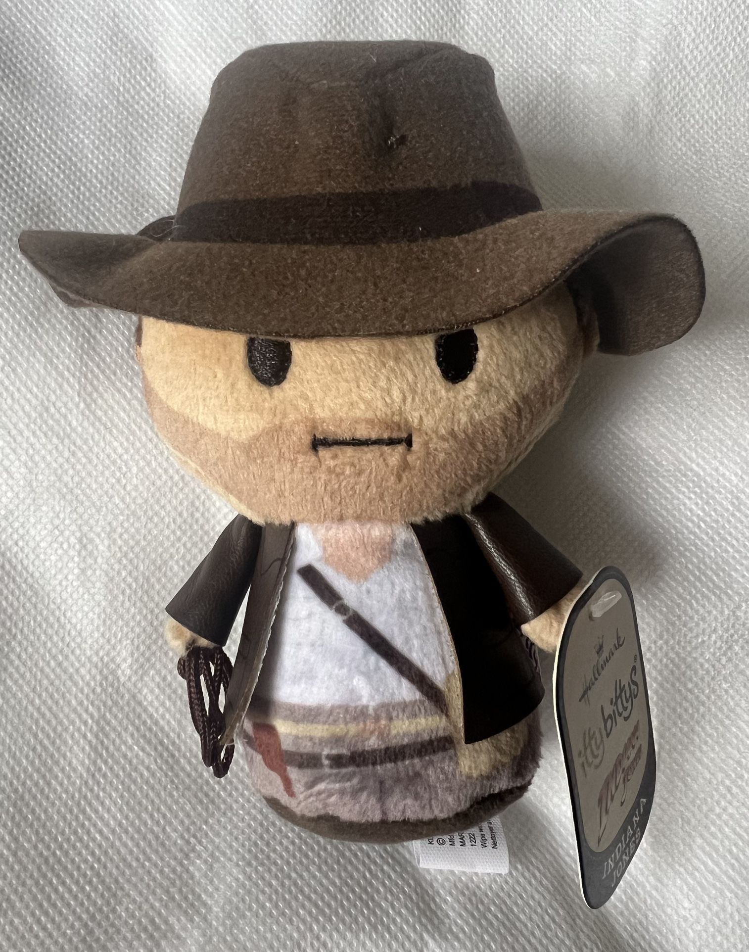 Brand New with Tags – Hallmark Itty Bittys Indiana Jones Mini Plush (5”) Bring home the legendary archaeologist with this officially licensed Hallmar