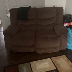 Chocolate Manual Reclining Sofa and Loveseat and carpet 