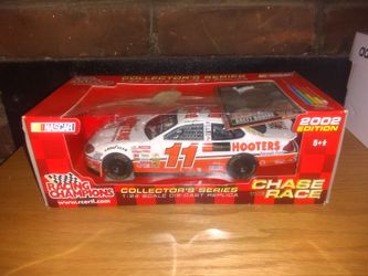 2002 Brett Bodine 1/24 Hooter's Racing Champions Die-cast car.