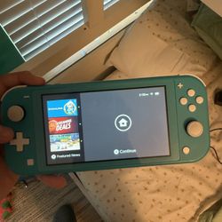 Nintendo Switch Lite With Charger And Mario Kart 8 Delux