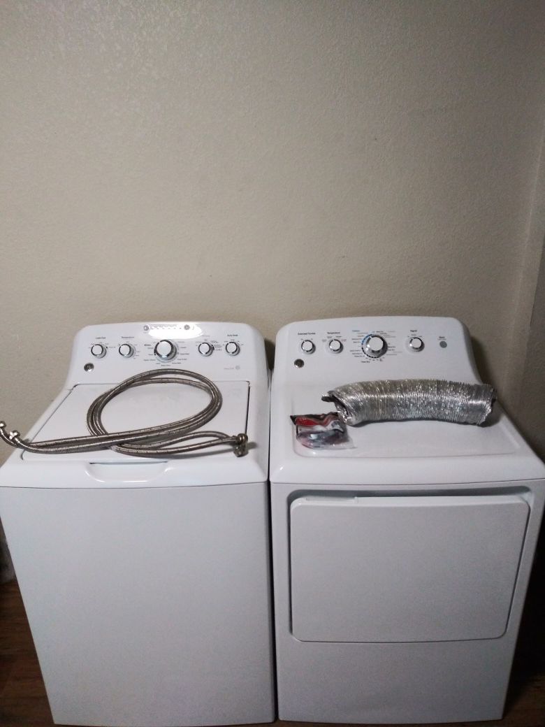 GUARANTEE ONE YEAR GE HEAVY-DUTY SUPER CAPACITY PLUS WASHER AND DRYER