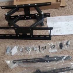 full motion TV wall mount 40 to 65 Inch..  works with all Tvs... new  in box 