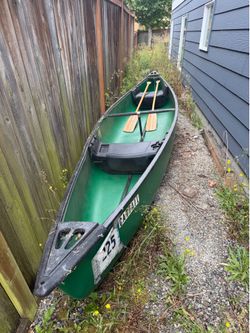 Coleman Canoe with Paddles