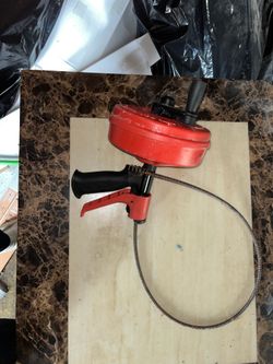 Handheld snake made for cleaning drains toilet and etc.