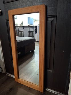 Vintage Mirror with wood frame.  (35¼ × 16½)