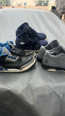 Michael Jordan shoes, gray shoes size 12- the dark blue are size 11.5 and the blue and black and gray are size 11.5 all men’s size $20 each