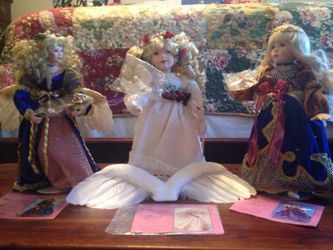 Porcelain angel doll collection like new condition make an offer separately or together. Very beautiful