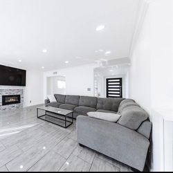 Gray sofa With Coffe table and dining table