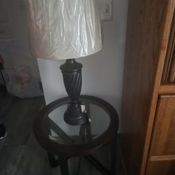 2 Manual Recline Sofas, 2 End Tables, Rug and Pillows.