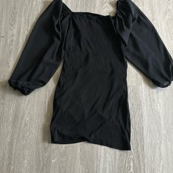 Dress with sheer sleeves and a low back, size L