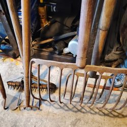 Old Pitchforks,Racks And Hoes