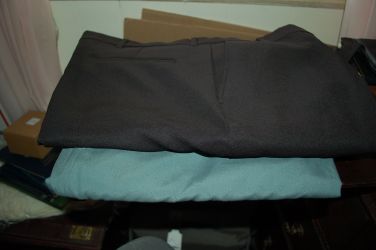 2 PAIR OF DRESS PANTS, GOOD USED CONDITION. BLACK 1 IS 44 WAIST X 29 LEG, BLUE ONE IS 44 WAIST X 30 IN . LEG