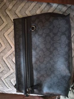 Coach Carry All Pouch in Signature Canvas (specifically the Charcoal/Black colorway, model CY985).