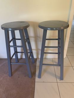 Two stools, gray color .