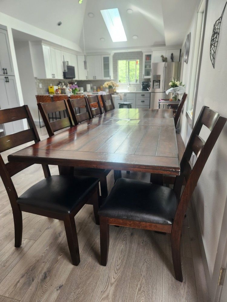 Dining Table for 8–10 People + 8 Chairs (Costco)