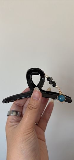 Claw clip with space inspired charms
