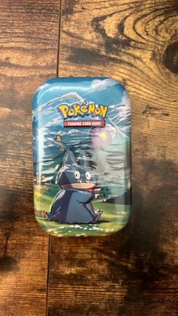 Pokémon munchlax and drifloon tin