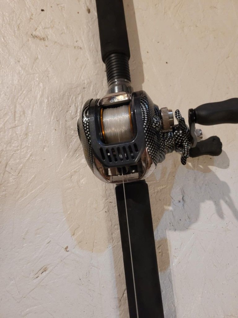 Lie Yu Wang LA12+1 6:3.1 Gear Reel On A Master SPECTRE 7ft MH Rod