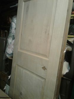 Four. 28" inch solid wood doors with no cut out for hardware 50 bucks each