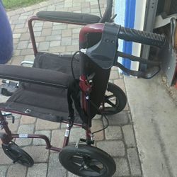 Midline Transport Chair With Foot Rest And Collapsible Back Rest
