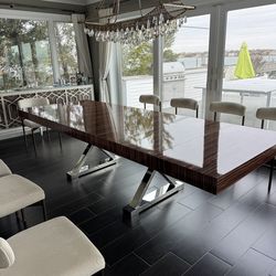 Gorgeous extendable 84 -124 inch dining table in a zebra lacquer wood table