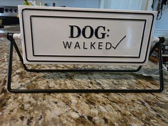 Dog needs a walk aluminum and steel flip sign.
