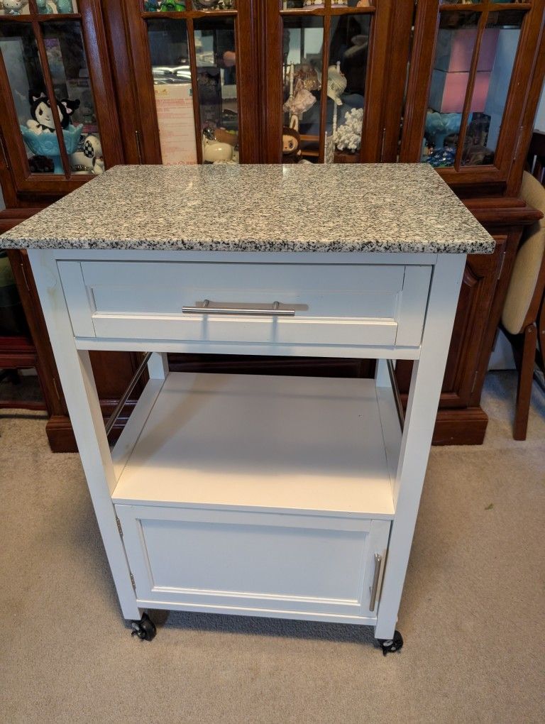 Granite Kitchen Cart With Towel Rack and 4 Wheels. Retail $200