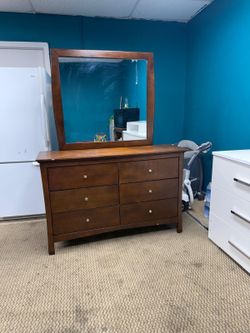 wooden cabinet with mirror