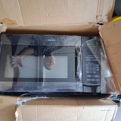 Hot Point Over TheRange Brand New Microwa