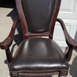 Black And Brown Cushioned Chairs