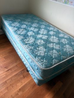 Twin mattress with matching box spring.
