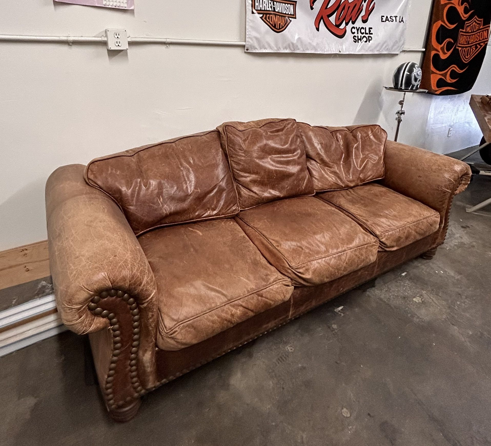 8’ Brown Leather sofa