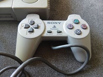 PS1 console original with cable and everything