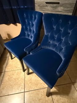 2 sway like, blue chairs