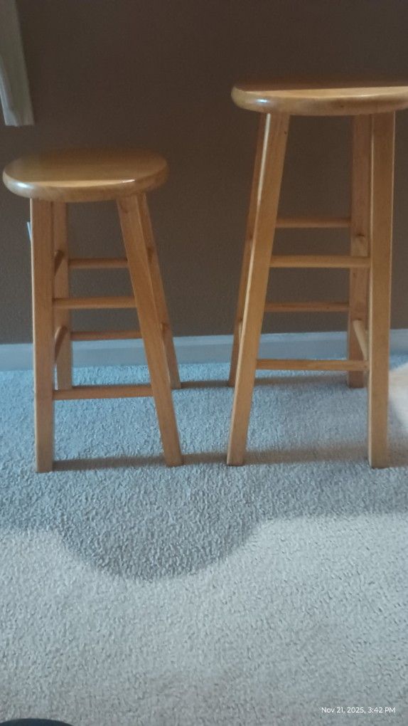 24' And A 29' Wooden Bar Stools