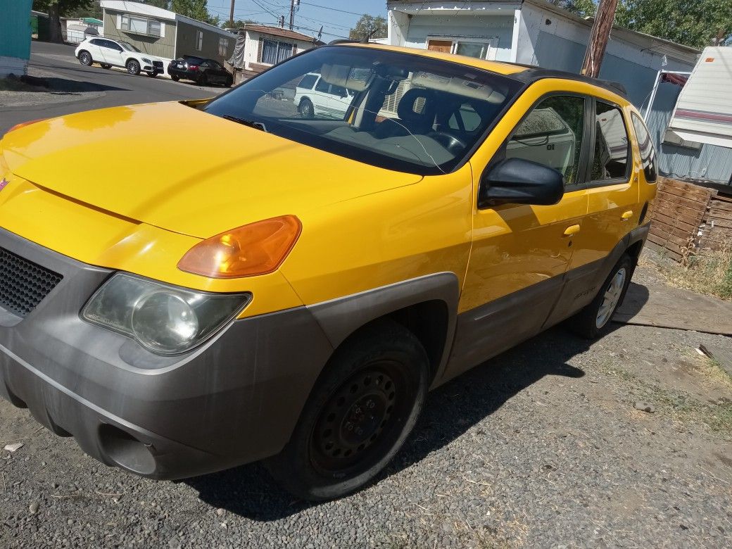 2001 Pontiac Aztec Yellow Outside And Grey Interior 6 Cylinder Fully Loaded With Sunroof Excellent Features Of Air Conditioning And Heating Also Heat